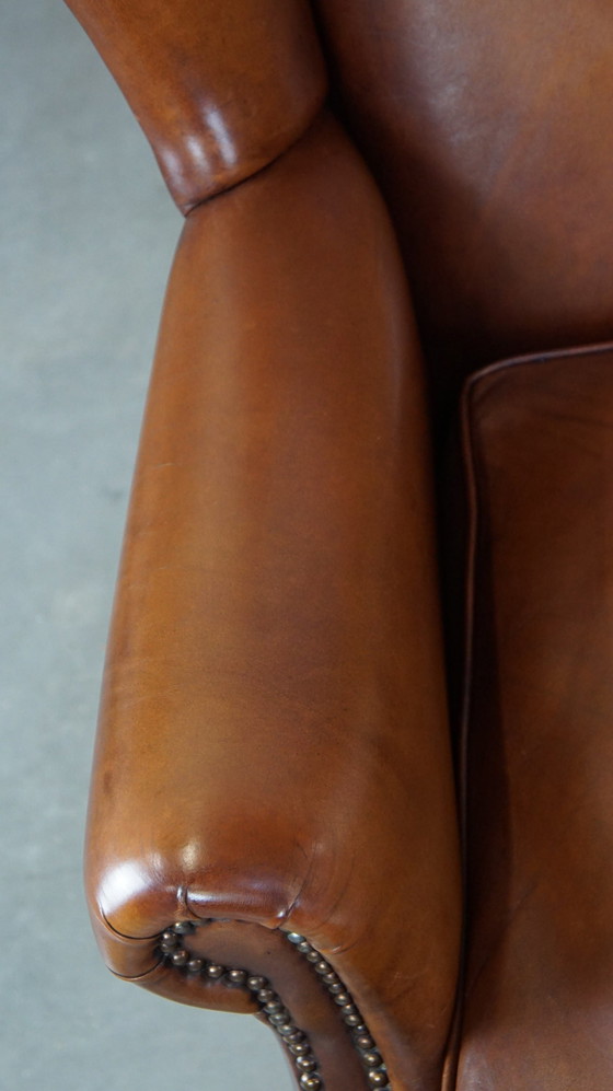 Image 1 of Fauteuil à oreilles en cuir de boeuf