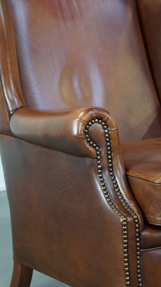 Image 1 of Fauteuil à oreilles en cuir de boeuf