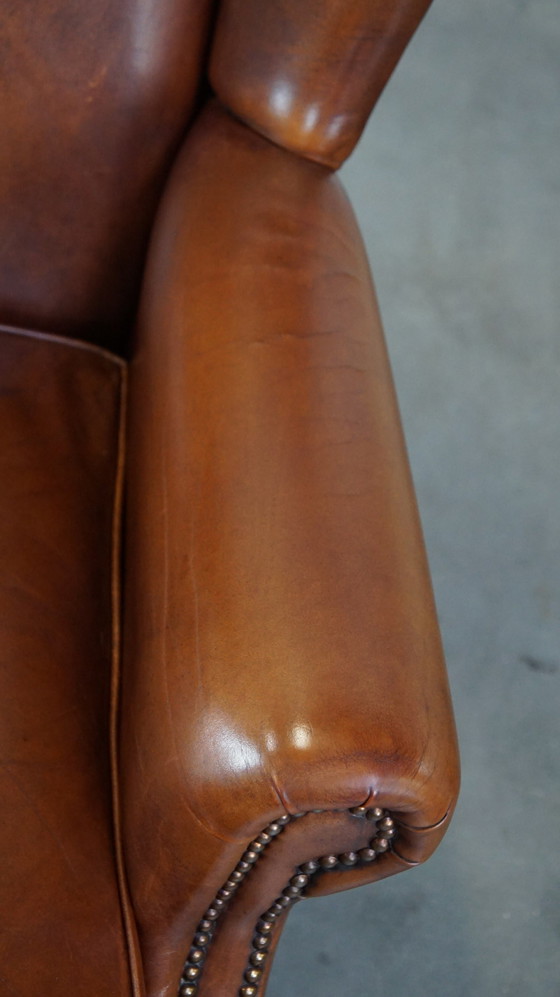 Image 1 of Fauteuil à oreilles en cuir de boeuf