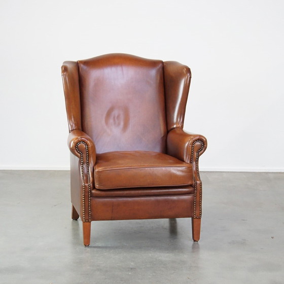 Image 1 of Fauteuil à oreilles en cuir de boeuf