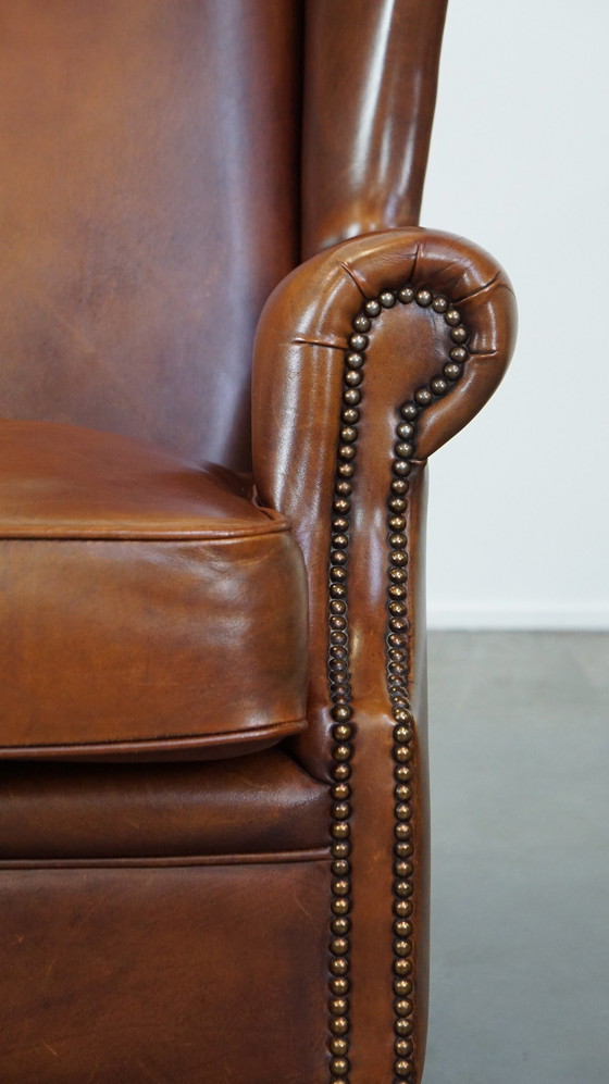 Image 1 of Fauteuil à oreilles en cuir de boeuf