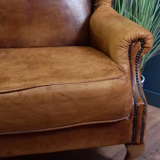 Image 1 of Fauteuil à oreilles en peau de mouton