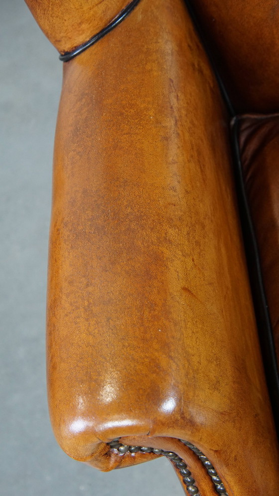 Image 1 of Fauteuil à oreilles en peau de mouton