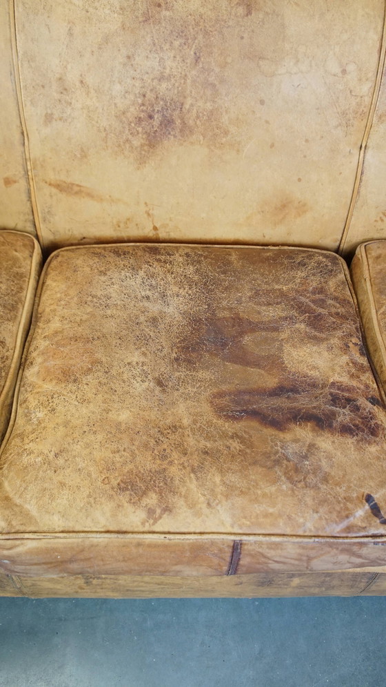 Image 1 of Canapé vintage 3 places en cuir de mouton avec pieds en bulbe