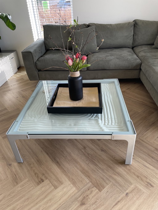 Table basse en verre avec sable