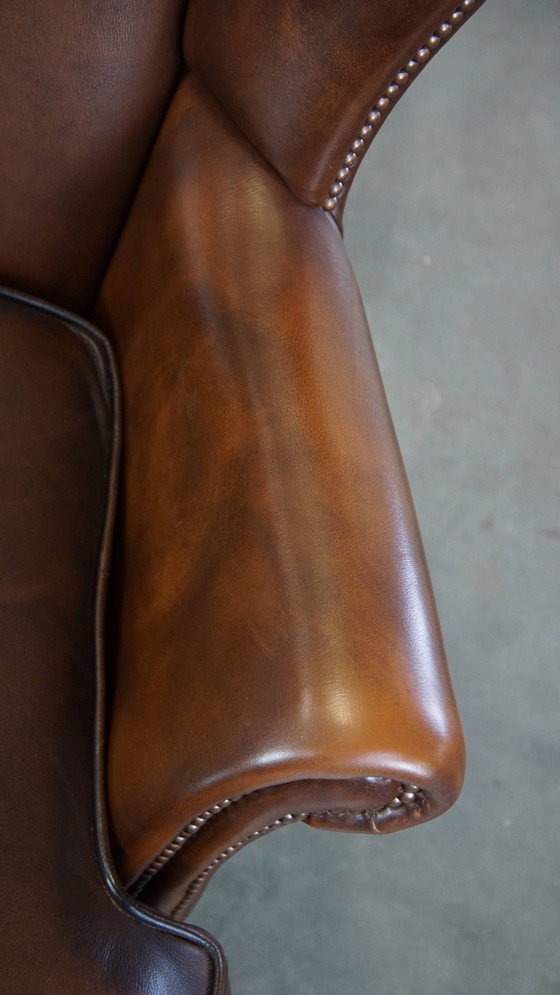 Image 1 of Fauteuil à oreilles en cuir de bœuf