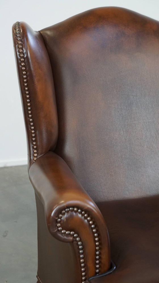 Image 1 of Fauteuil à oreilles en cuir de bœuf