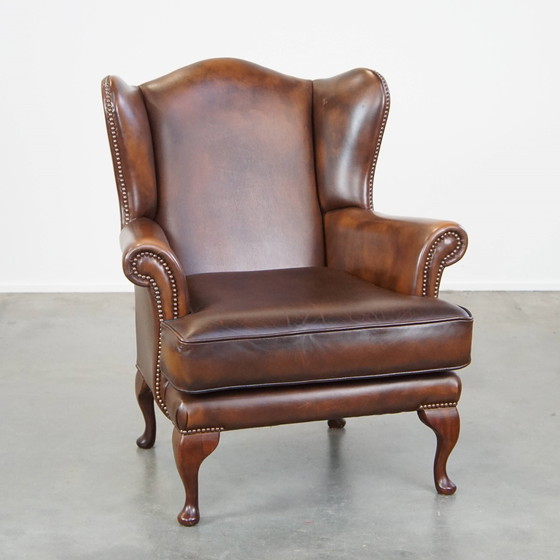 Image 1 of Fauteuil à oreilles en cuir de bœuf