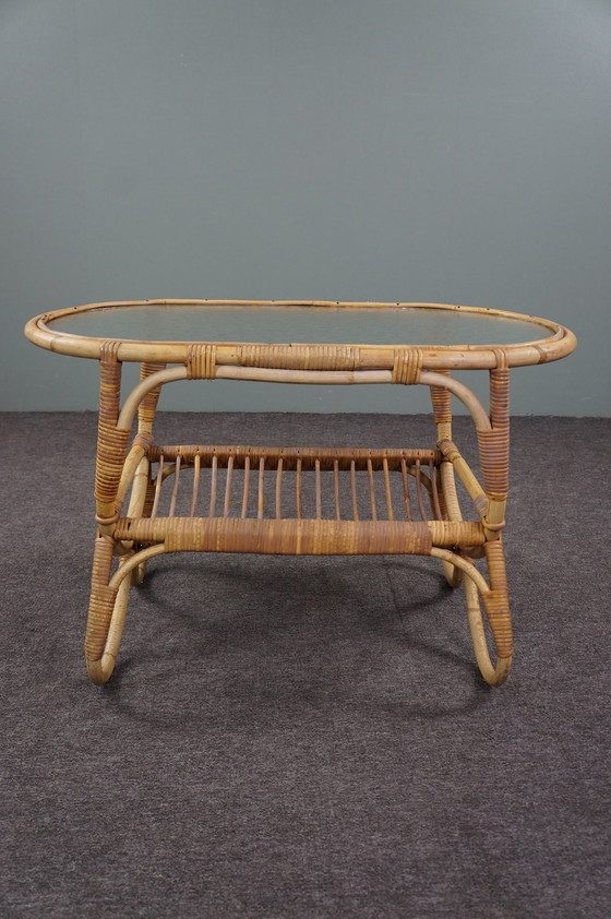 Image 1 of Dutch Design Couchtisch mit Wolkenglasplatte und Lesekorb