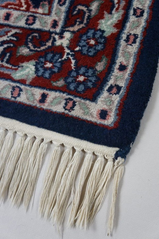 Image 1 of Blauer Orientteppich mit floralem Muster, 150 x 90 cm