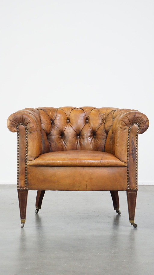 Schafsfell Chesterfield Sessel auf Rädern