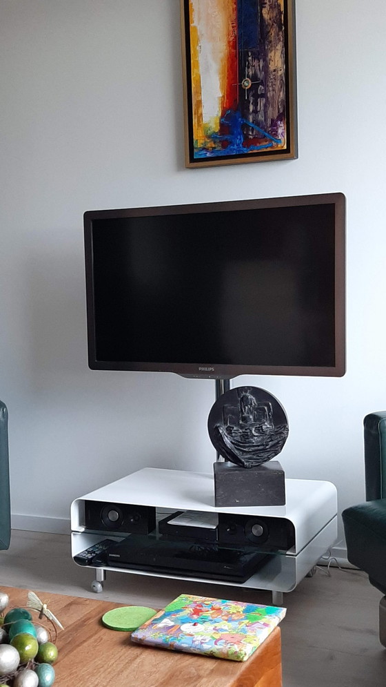 Image 1 of Bronzeskulptur "Familie auf dicker Scheibe". (Im Preis reduziert)