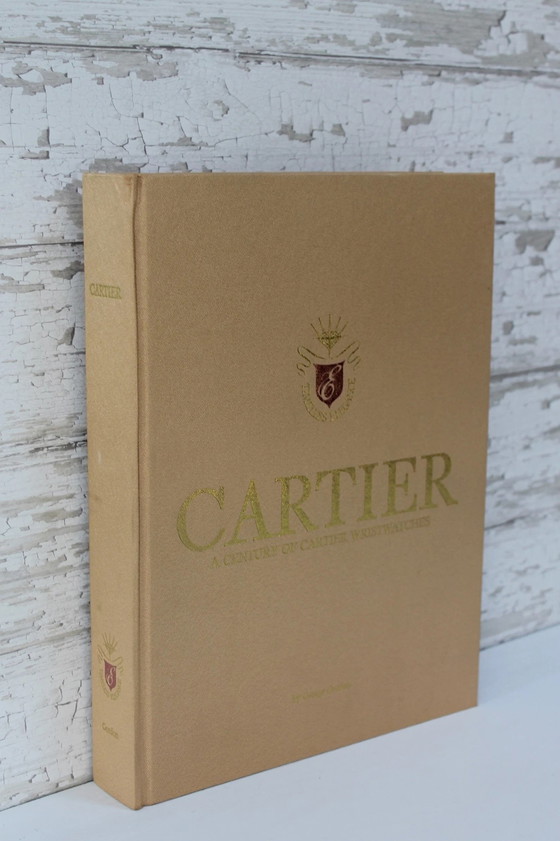 Image 1 of Cartier - Ein Jahrhundert von Cartier Armbanduhren Coffee Table Book von George Gordon im Schuber