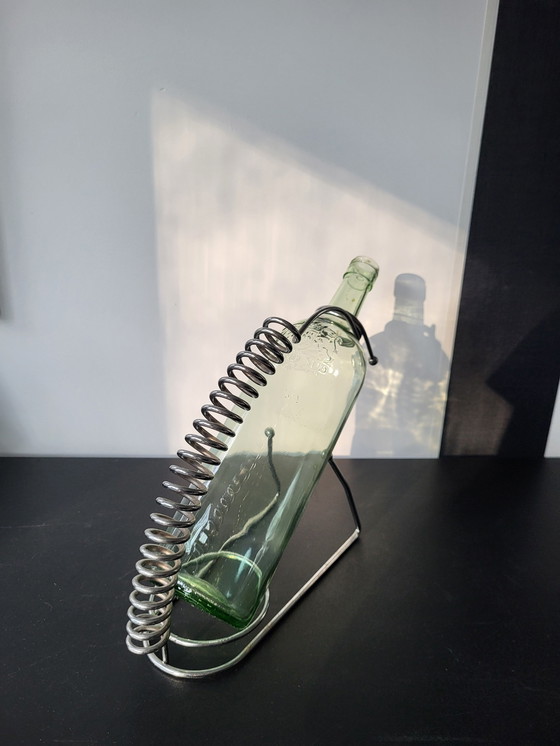 Image 1 of Weinflaschenhalter aus Chrom.