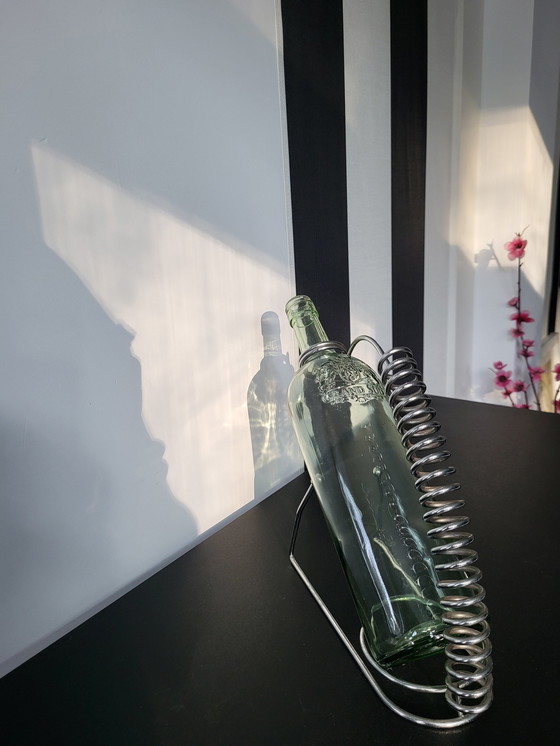 Image 1 of Weinflaschenhalter aus Chrom.