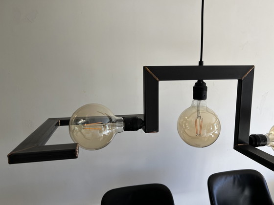 Image 1 of Moderne Eisenlampe mit Beleuchtung