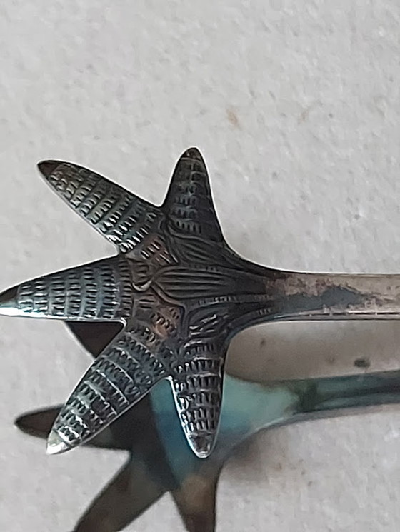 Image 1 of WMF versilberter Hahnenfußgreifer