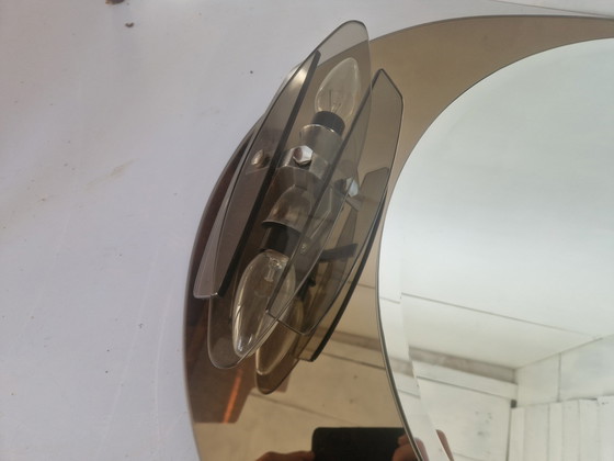 Image 1 of Italienischer Raumzeitalter-Spiegel mit zwei Wandleuchtern