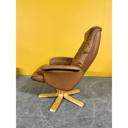 Dänischer Vintage-Drehsessel in cognacfarbenem Leder, 1970er Jahre