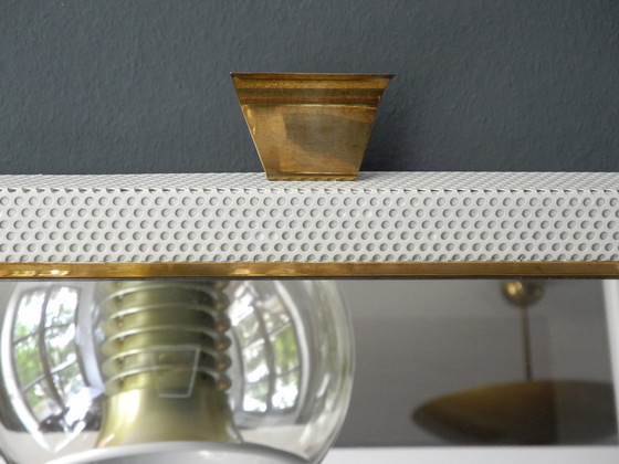 Image 1 of Original Mid Century Modern XXL Leuchtspiegel mit perforiertem Metallrahmen und Messingdetails | Made in France