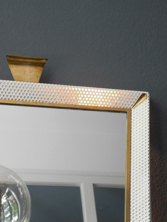 Image 1 of Original Mid Century Modern XXL Leuchtspiegel mit perforiertem Metallrahmen und Messingdetails | Made in France