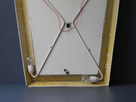 Image 1 of Original Mid Century Modern XXL Leuchtspiegel mit perforiertem Metallrahmen und Messingdetails | Made in France