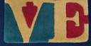 Robert Indiana: "Sommerliebe". Teppichboden.