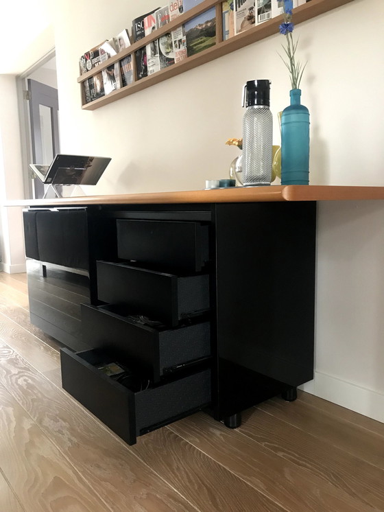 Image 1 of Design Sideboard Schwarz Hochglanz mit schräger Kirschholzplatte