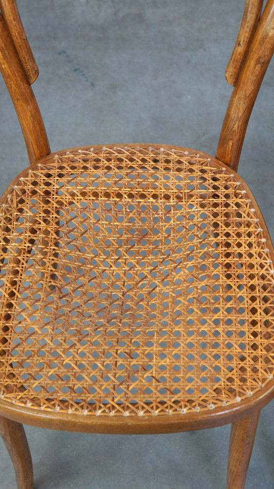 Image 1 of 2 x brauner Vintage Thonet/Bistrostuhl mit geflochtener Sitzfläche
