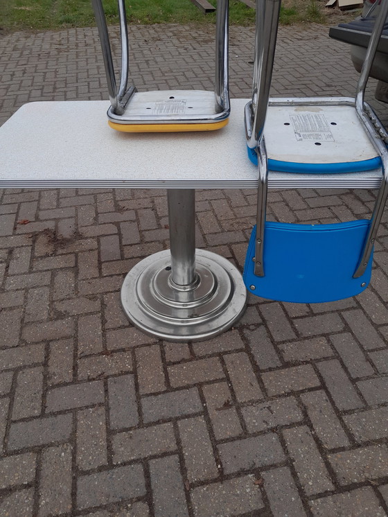 Image 1 of Mcdonalds Tisch und 2 Stühle Sechziger Jahre.
