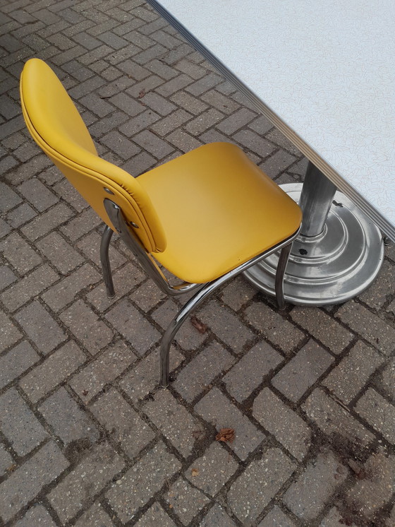 Image 1 of Mcdonalds Tisch und 2 Stühle Sechziger Jahre.