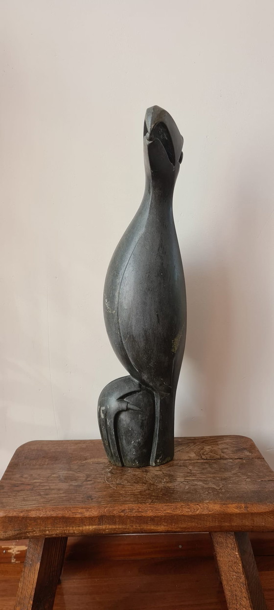 Image 1 of Bild eines fütternden Vogels