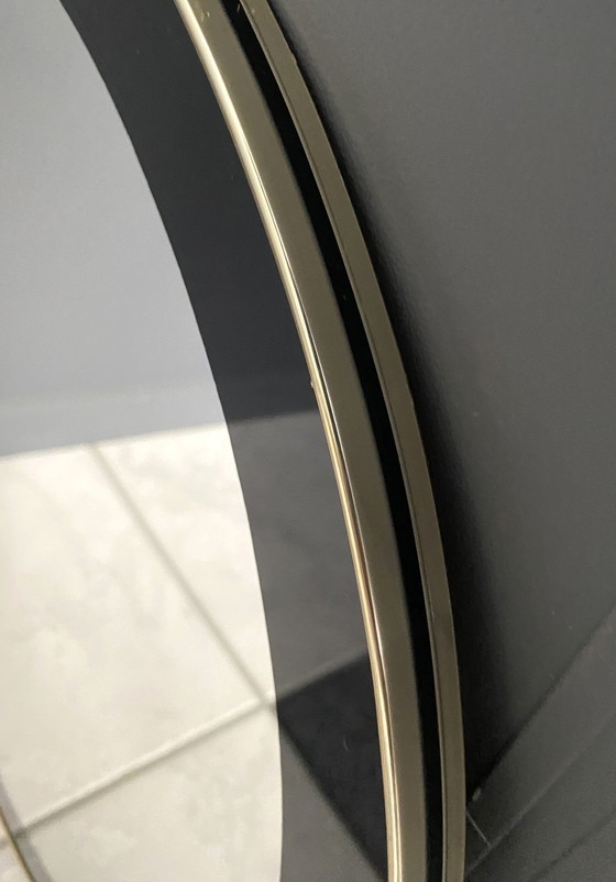 Image 1 of Runder Spiegel mit schwarzer Dekoration 1960S