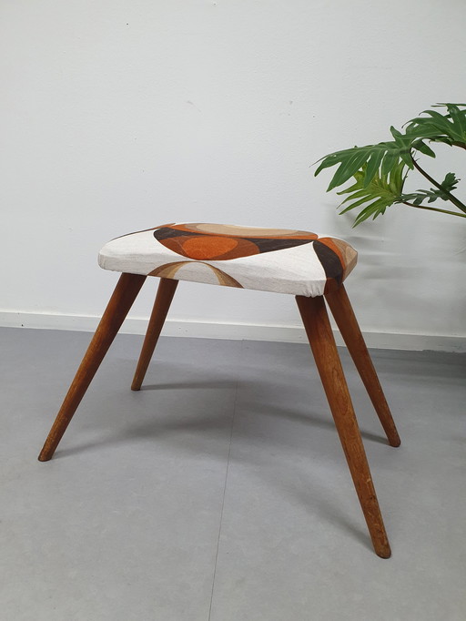 Hocker/Fußhocker mit Vintage-Polsterung.