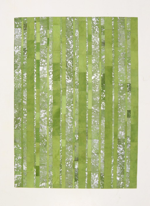 Haus der Teppiche Grüner koeienhuid tapijt