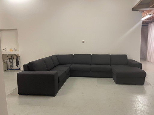 Schönes U-Eck-Sofa aus grauem Stoff