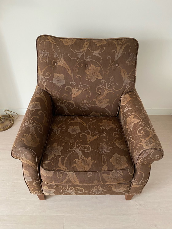 Image 1 of Designstuhl braun mit Aufdruck