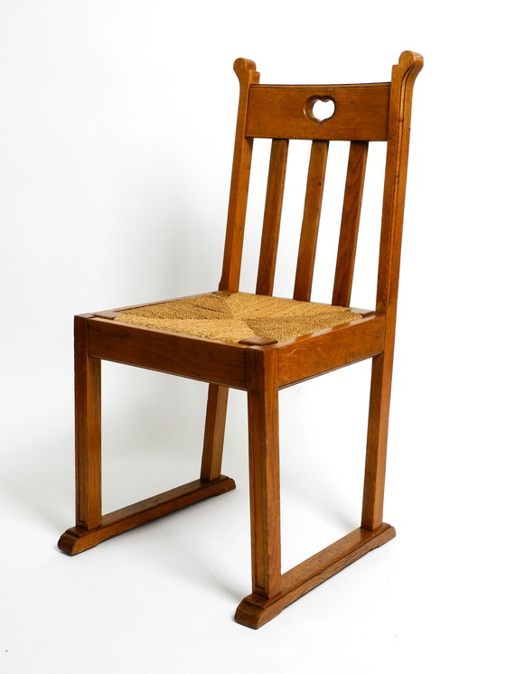 Image 1 of Ein Paar Mid Century Eichenstühle mit Kufenfüßen und Korbsitzen