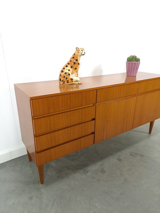 Image 1 of Anrichte aus Teakholzfurnier Barschrank mit Schubladen und Klapptüren