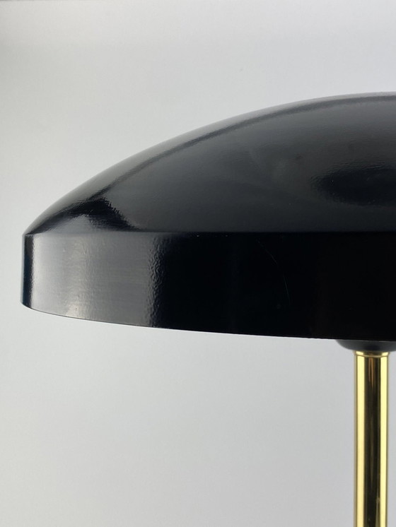 Image 1 of Seltene schwarz-goldene Tischleuchte Ufo von Louis Kalff für Philips