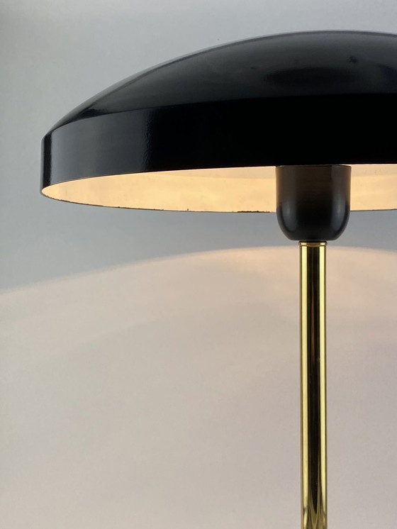 Image 1 of Seltene schwarz-goldene Tischleuchte Ufo von Louis Kalff für Philips