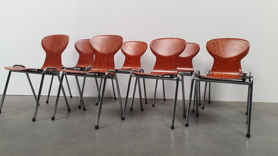 Image 1 of 8x Eromes Pagholz stapelbarer Designerstuhl