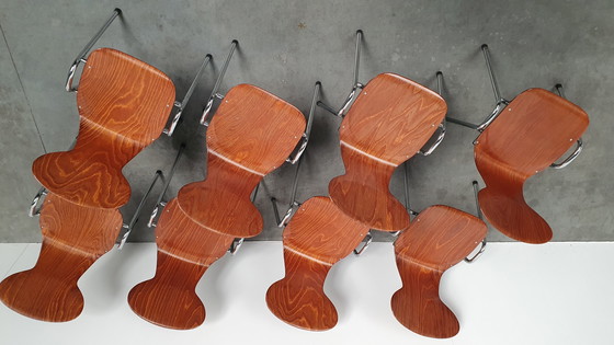 Image 1 of 8x Eromes Pagholz stapelbarer Designerstuhl