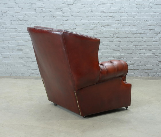 Image 1 of Chesterfield Style Tufted Oxblood Red Leather Lounge Wingchair, England, 1950er Jahre. Ref.: CH218