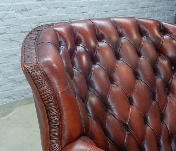 Image 1 of Chesterfield Style Tufted Oxblood Red Leather Lounge Wingchair, England, 1950er Jahre. Ref.: CH218