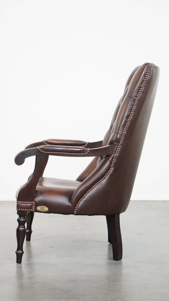 Image 1 of Chesterfield-Sessel aus dunklem Rindsleder und Holz