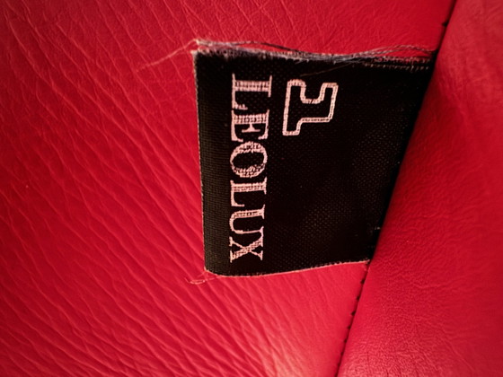 Image 1 of Leolux Balou roter Ledersessel mit Ottomane