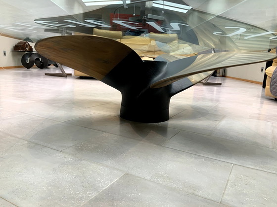 Image 1 of Glas Couchtisch mit Bronze Schraube