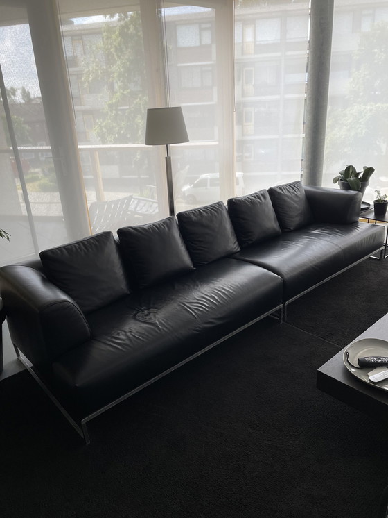 Image 1 of 2x B&B Italia Sofas schwarzes Leder mit 2x Fußhocker und Beistelltisch