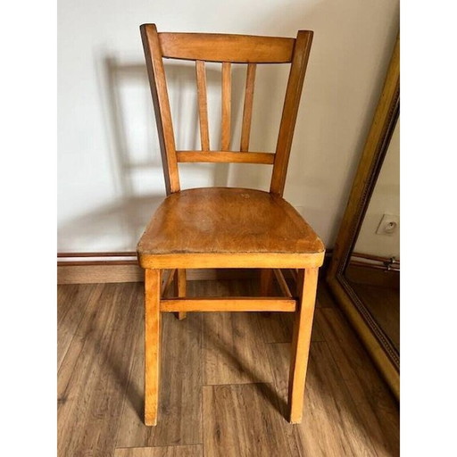 Satz von 4 uneinheitlichen Holzstühlen im Vintage-Stil